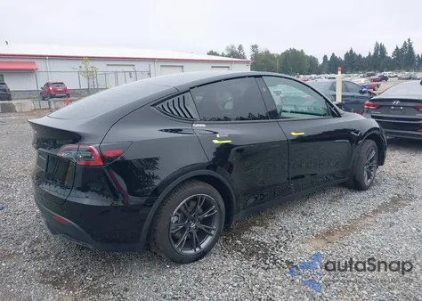 2024 Tesla Model Y из США, поврежденный, VIN 7SAYGDED1RF159399